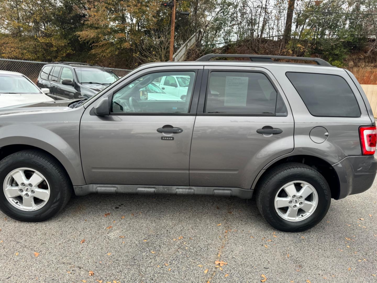 2011 Gray Ford Escape (1FMCU0DG2BK) , located at 307 West Marshall Avenue, Longview, TX, 75601, (903) 753-3091, 32.500828, -94.742577 - Photo#0